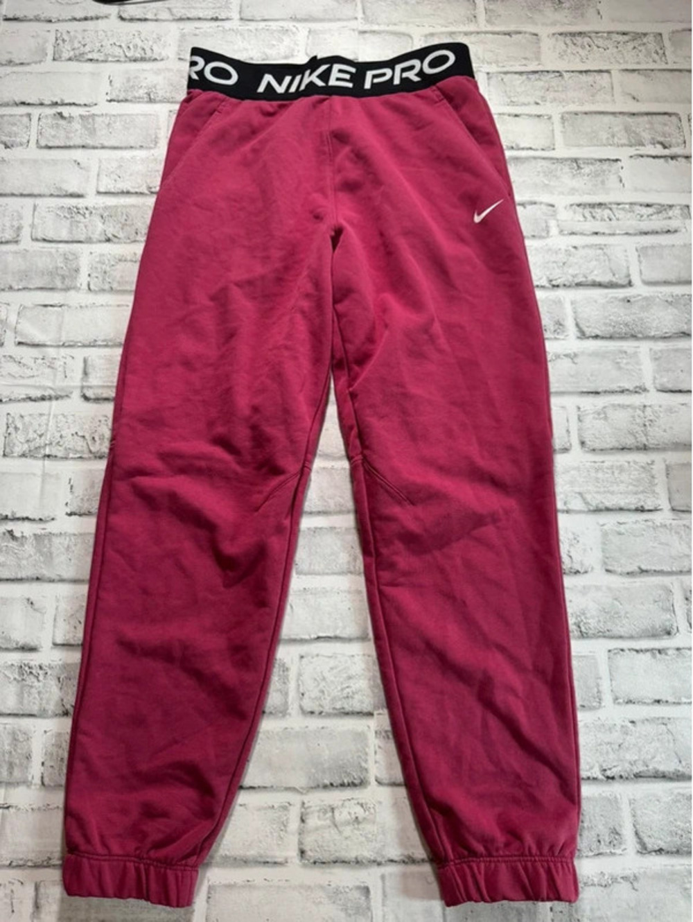 Girl’s Nike Pro Dri-fit pink pull-on joggers size Large